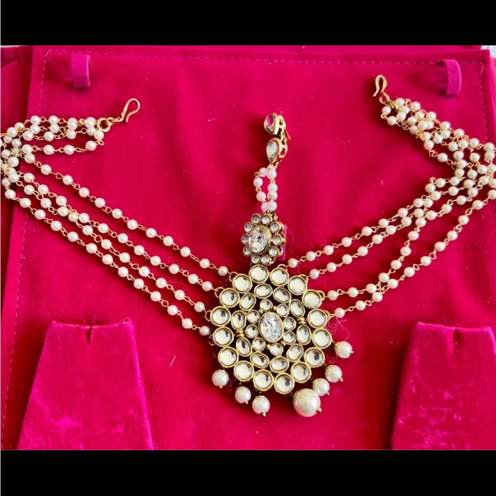 Elegant Gold and pearl hairpiece ( Maatha- Patti)